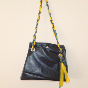 cartera colchón inflable negro y pvc trenzado reutilizado